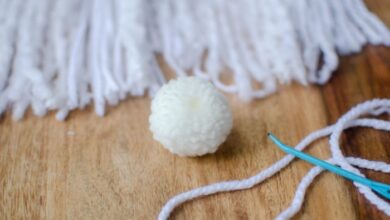 Diy yarn pom pom snowballs music