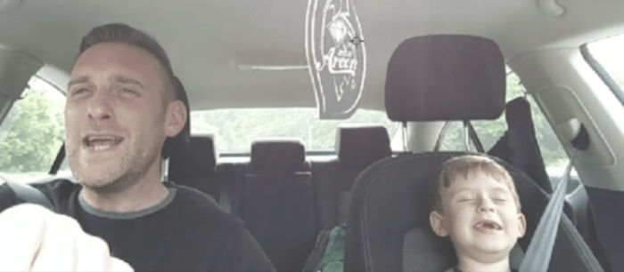 Darling father and son lip sync road trip style