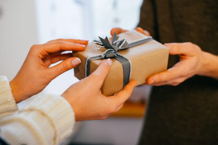 Giving christmas gift kids enough much balance