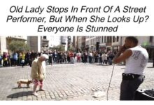 This old lady stops in front of a street performer and lets loose