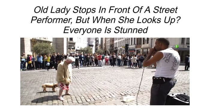 This old lady stops in front of a street performer and lets loose